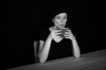 Focused businesswoman making strategic decisions during coffee break