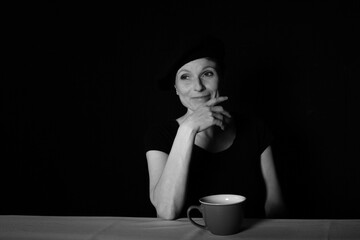 Confident businesswoman enjoying coffee break with relaxed mindset