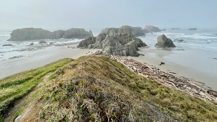 Sea Stacks Bandon Oregon. Sea stacks along the Oregon Coast complimented by a large sand dune in the foreground