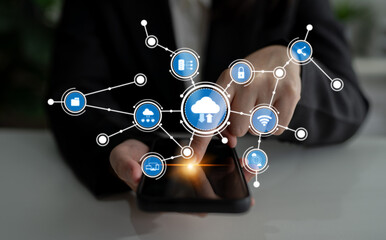 A modern depiction of cloud computing concepts showcasing a user interacting with a smartphone while icons represent various digital services and connections. Tessel