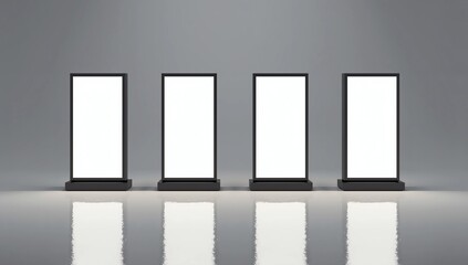 four vertical illuminated lightbox displays standing side-by-side