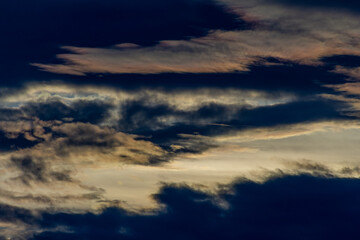 Cloudscape, Colored Clouds at Sunset near the Ocean in a Tropical Climate in Venezuela
