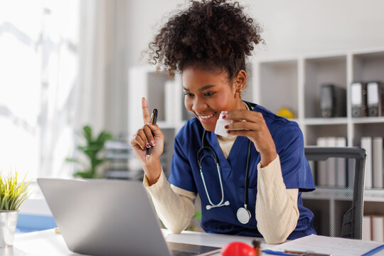 Woman, nurse and tablet with laptop for medical research, study or discovery at hospital. Female person, employee or healthcare worker browsing with technology for telehealth app or results at clinic

