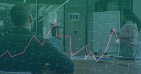 Presenting woman in light top dark pants pointing at flip chart at conference table, pink overlay