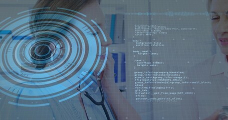 Consulting two female doctors, lab coat stethoscope and blouse in clinic with HUD and code overlay