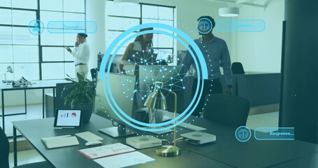 Showing blue AR AI overlay above open office, laptop, team in biz-casual talking, colleague phoning