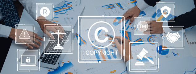 Professionals collaborate in a business meeting, analyzing charts and graphs on a laptop while discussing copyright and legal concepts at a conference table. Trope