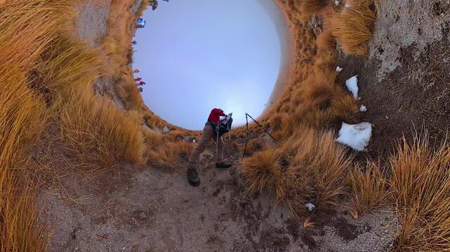 Hiker setting up a tripod on la malinche volcano summit