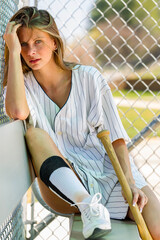 Springtime Confidence: A Radiant Athlete Shines on the Sunlit Baseball Diamond