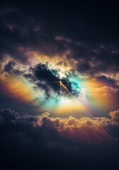Naklejka premium Celestial Panorama: An ethereal spectacle unfolds in the sky, where the sun's radiant beams pierce through the dark, cloud-filled expanse, illuminating a dazzling spectrum of colors. 