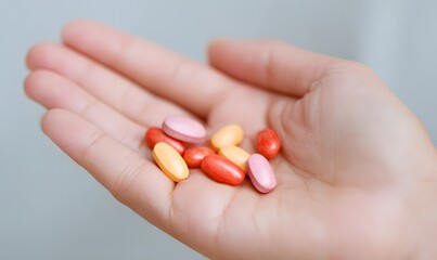 diet pills in a hand