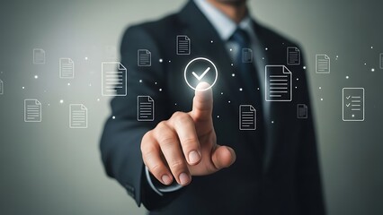 Businessman touching a virtual screen to verify digital documents and approve files online