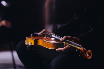 Concert view of violinist with vocalist and musical band, fiddler performing classical music,...