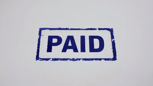 Paid stamp impression on white background  