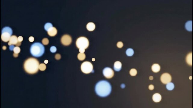 Festive abstract background with glowing bokeh lights in blue and gold tones on a dark backdrop, perfect for celebrations and holiday themes