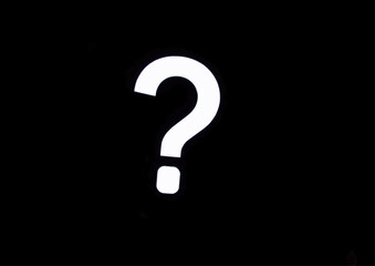 Question mark symbol on a black background for inquiry and information themes