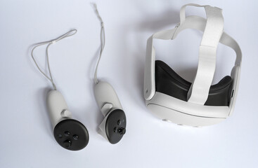 VR headset with controllers isolated on white background