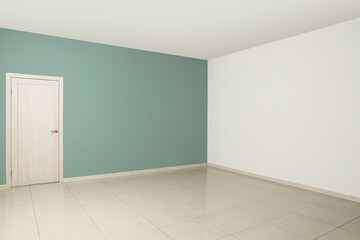 View of green and white walls with door in big empty room