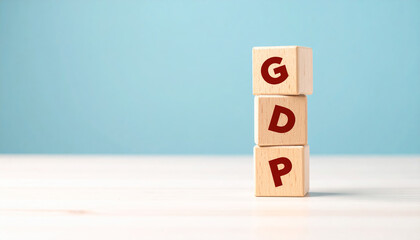 GDP concept with wooden blocks stacked on table symbolizing global economy slowdown and economic recession crisis affecting finance business market