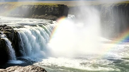 Waterfall with Rainbow and Misty Spray.