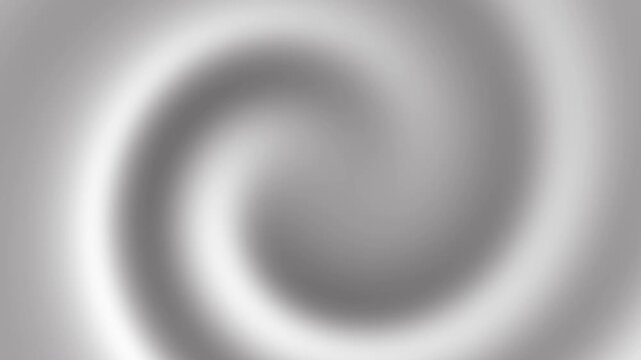 Blurred grey and white spiral or vortex pattern ideal for background, design elements, and abstract concepts in graphic design projects.