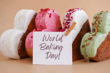 World baking day greeting card Delicious fresh croissant topped with colorful flavor Ganache....