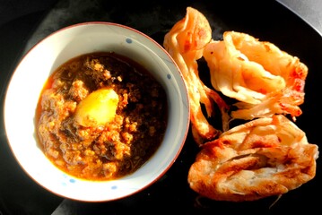 Roti with goat curry , Traditional Asian food.