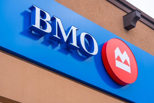 BMO Canadian Bank of Montreal sign on a building from a low angle close up financial institution