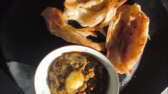Roti with goat curry , Traditional Asian food.