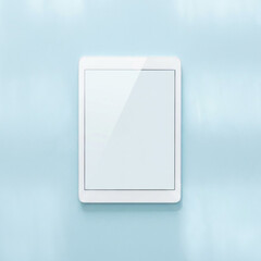 Modern white tablet on light blue background with blank screen