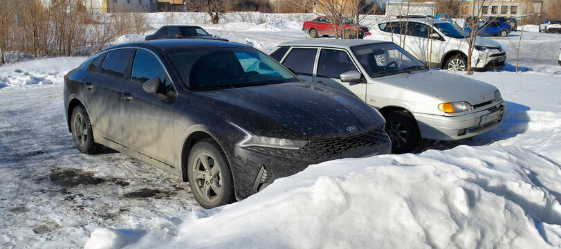 Kazakhstan, Ust-Kamenogorsk, march 1, 2024: Kia K5 and Lada Samara 2 (2114)