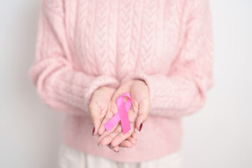 Pink October Breast Cancer Awareness month, woman with pink Ribbon for concepts of support people life and illness. National cancer survivors month, Women Health day and February World cancer day