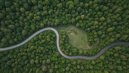 &ldquo;Aerial View of Scenic Winding Road Through Dense Green Forest and Rolling Hills, Curved Highway Landscape, Natural Wilderness, Summer Nature Travel, Environmental Conservation and Eco Tourism Concept