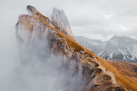 Scenic landscape view of the Dolomites Alps featuring the Odle mountain range and Seceda peak in Italy. Captures dramatic alpine scenery,