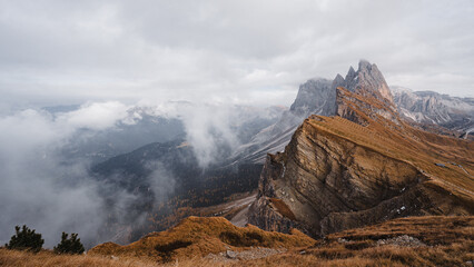 Scenic landscape view of the Dolomites Alps featuring the Odle mountain range and Seceda peak in Italy. Captures dramatic alpine scenery,