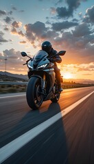 &ldquo;Sport Motorcycle Rider Racing on Open Highway at Sunset, Powerful Superbike Speeding on Asphalt Road, Freedom Ride, Adventure Travel, High Performance Motorbike, Extreme Speed and Lifestyle Concept&rdquo;