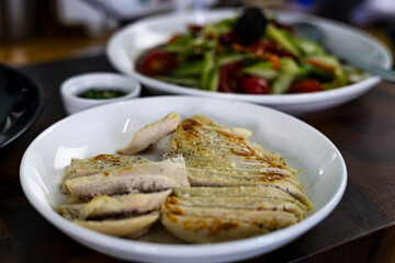 Grilled Chicken Breast On White Ceramic.