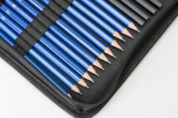 colored pencils on white background