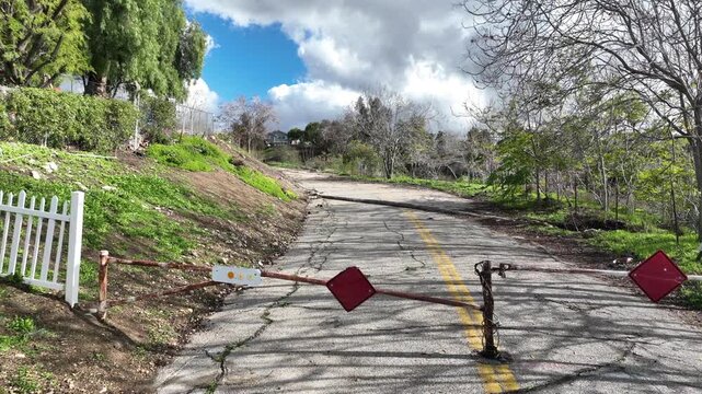 A Contractor Using a Drone to Inspect a Road
