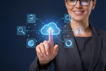 Businesswoman touching virtual cloud icon on digital interface with data charts and graphs