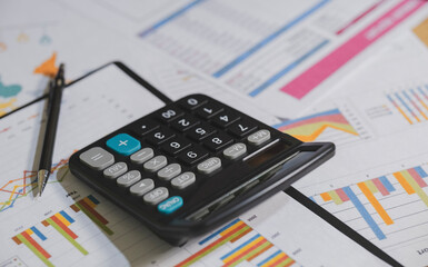Close-up of a calculator and financial documents, budget planning, accounting