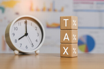 Tax Deadline 2026 Conceptual Image Representing Future Taxes, Financial Planning, Word tax spelled out in wooden blocks,