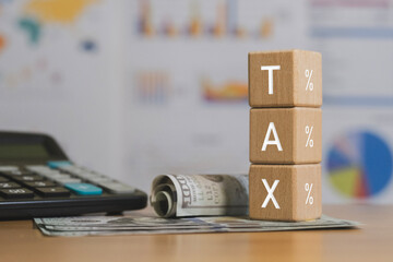 Tax Deadline 2026 Conceptual Image Representing Future Taxes, Financial Planning, Word tax spelled out in wooden blocks,