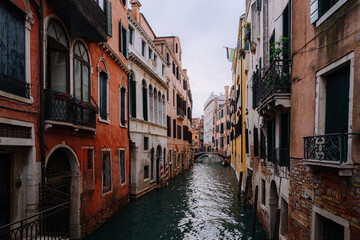 Venetian Gondolier Transporting Tourists on Gondola Along the Grand Canal, Venice, Italy
