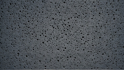 High Resolution Dark Gray Porous Concrete Texture, Gritty Industrial Cement Wall Background for Urban Branding and Design