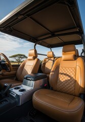 Obraz premium Luxury vehicle interior shows quilted tan leather seats overlooking an open landscape