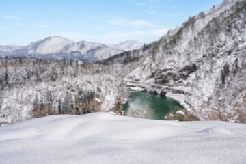 Natural winter background with snow drifts and beautiful landscape with copy space