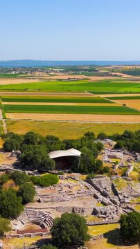 Vertical video. Tevfikiye, Turkey. Aerial landscape view of the Trojan plain and the Dardanelles strait from the site of ancient Troy in Canakkale Province. Aerial view, Point of interest. Rich color