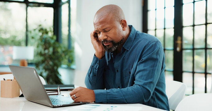 Fatigue, headache and black man in office with laptop for mistake, error or failure on finance report. Computer, migraine and African financial manager with stress for investment deal in workplace.