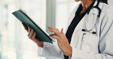 Hands, person and doctor with tablet in hospital for research, medical report and confirm surgery. Surgeon, digital and scroll on website for Telehealth, healthcare results and treatment information